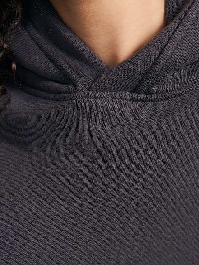 Теплое худи со стразами на спине