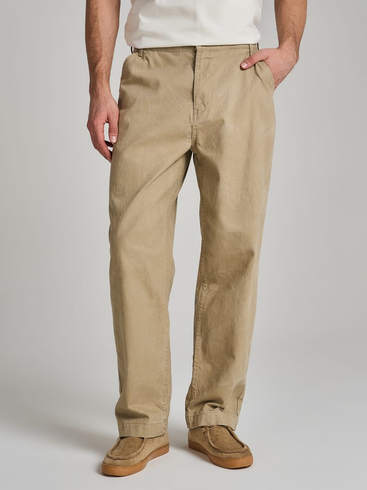 Зауженные брюки с вареным эффектом