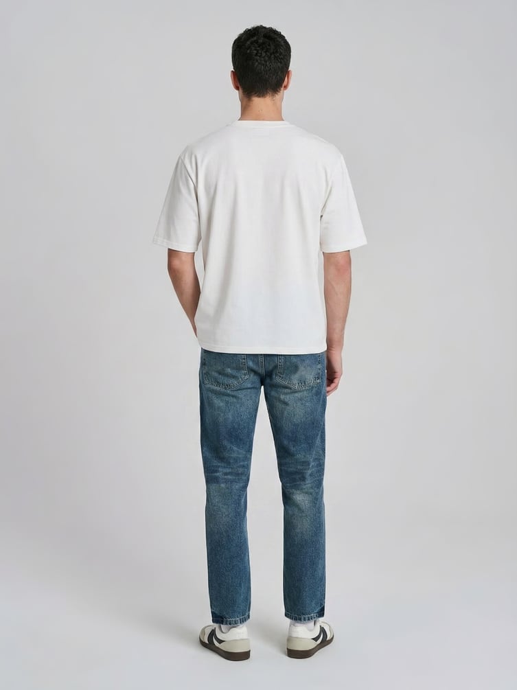 Джинсы прямые укороченные с разрезами