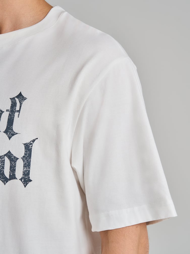 Футболка с надписью в стиле дрейн