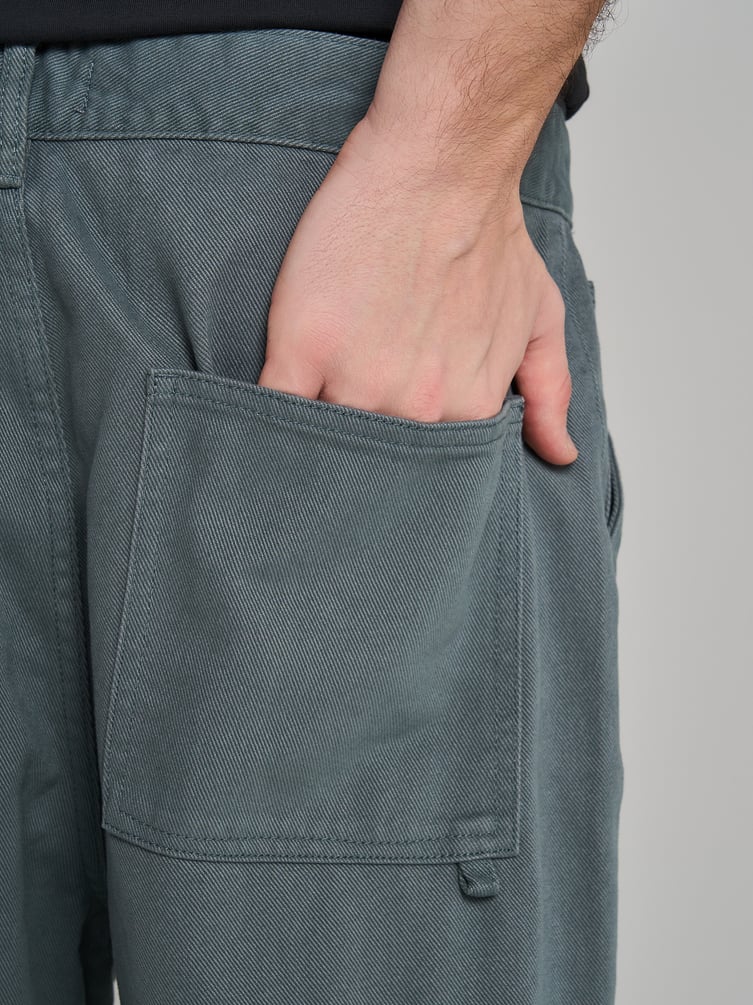 Зауженные широкие брюки