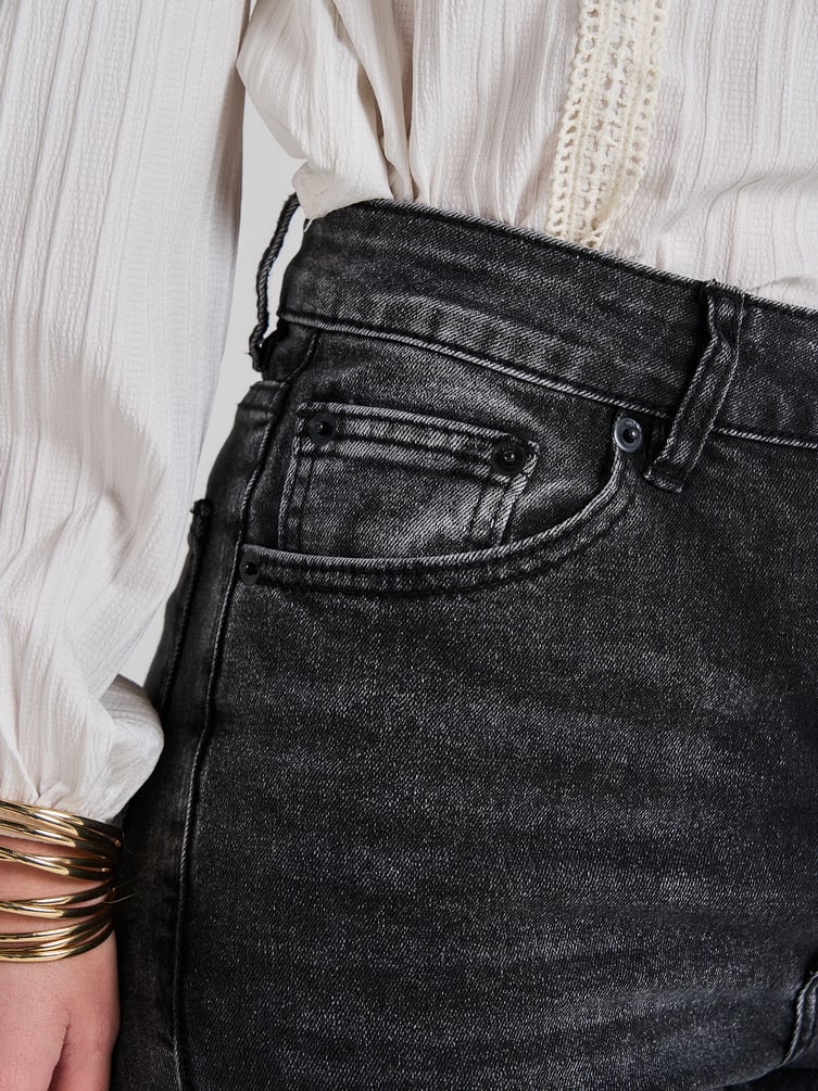 Джинсы клеш от колена