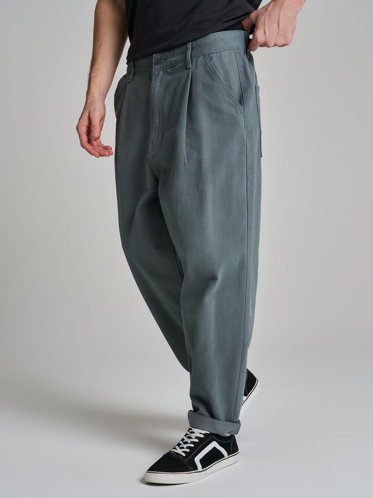 Зауженные широкие брюки