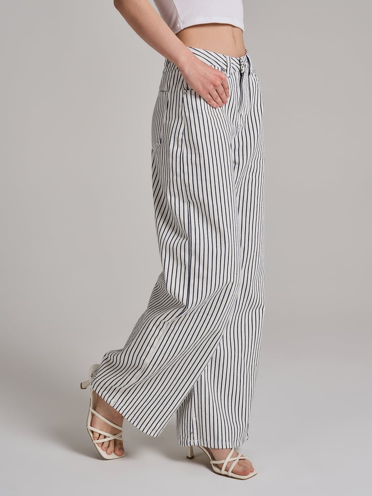 Джинсы широкие в полоску