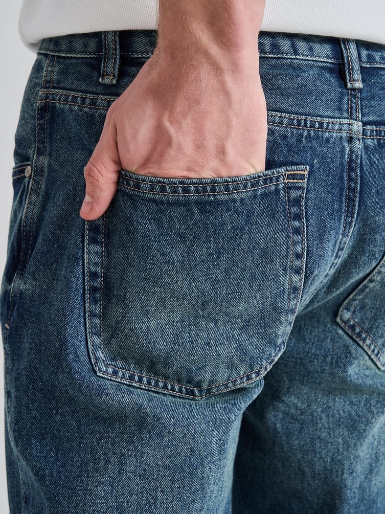 Джинсы прямые укороченные с разрезами