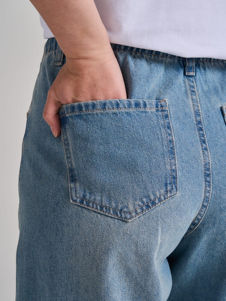 Широкие джинсы на резинке