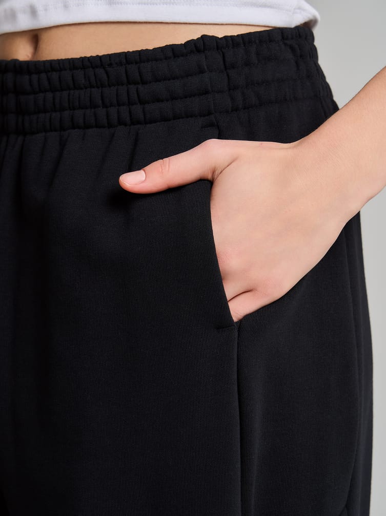 Брюки джоггеры с завязками по бокам