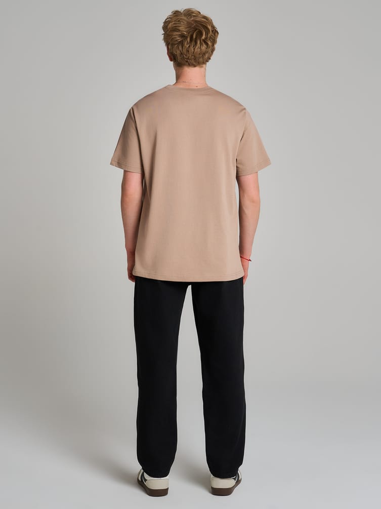 Джинсы зауженные Carrot