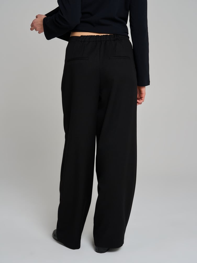 Брюки бананы классические