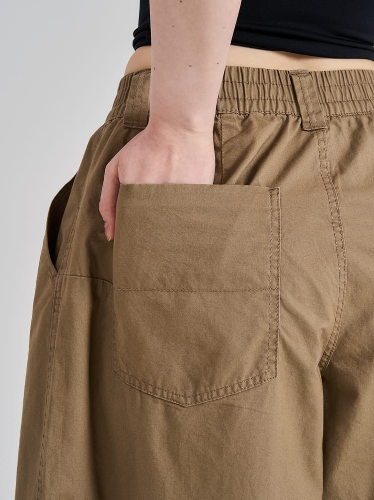 Брюки-бананы с защипами