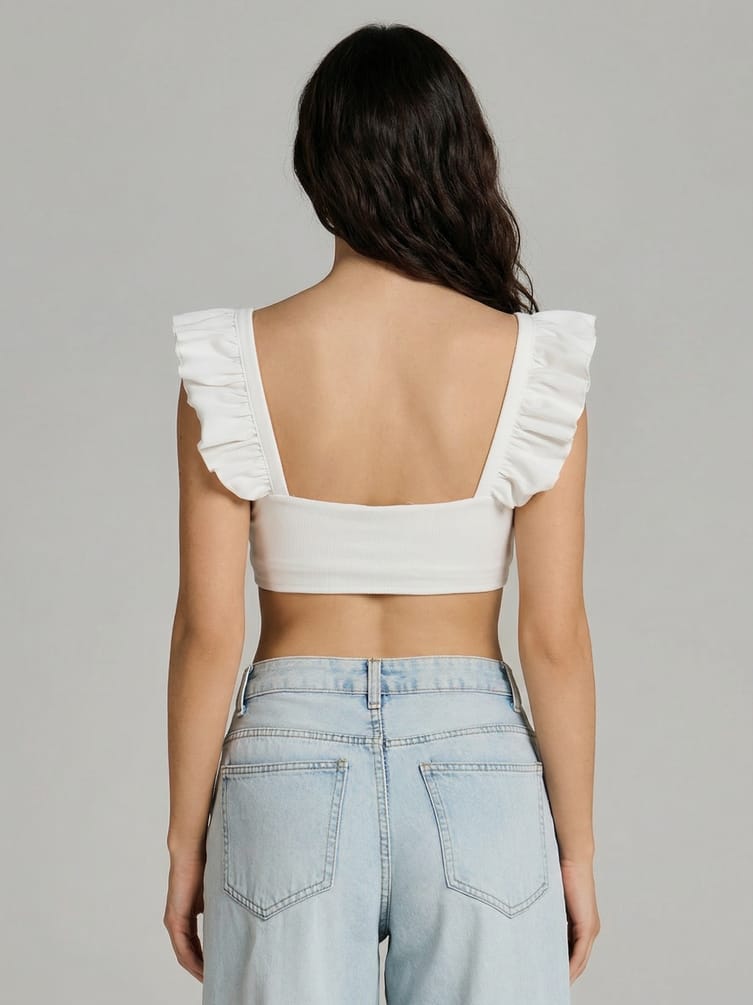 Короткий топ с оборками на лямках