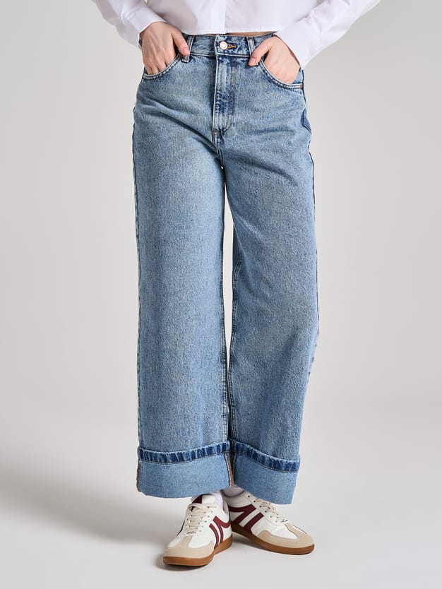 Джинсы широкие с подворотами