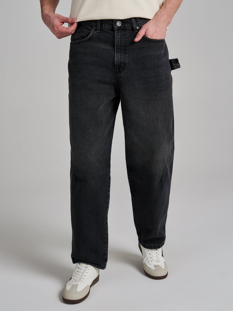 Джинсы багги зауженные с декоративной петлей