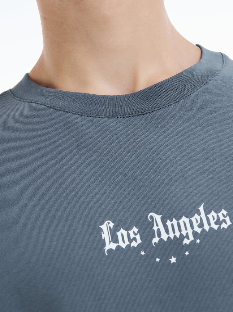 Футболка оверсайз с принтом ангелов на спине