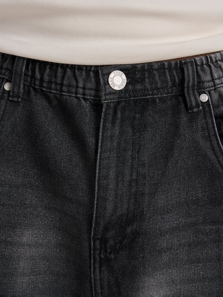 Джинсы багги с вареным эффектом