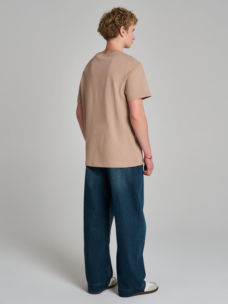 Джинсы широкие