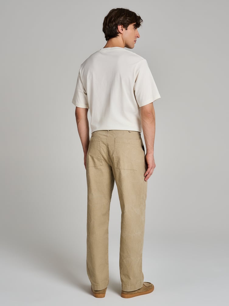 Зауженные брюки с вареным эффектом