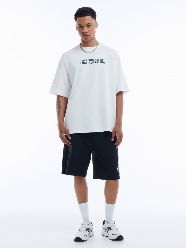 Футболка оверсайз с принтом аудиоплеера на спине