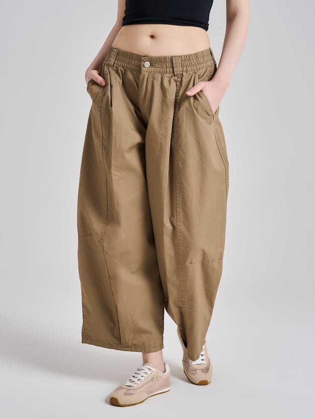 Брюки-бананы с защипами