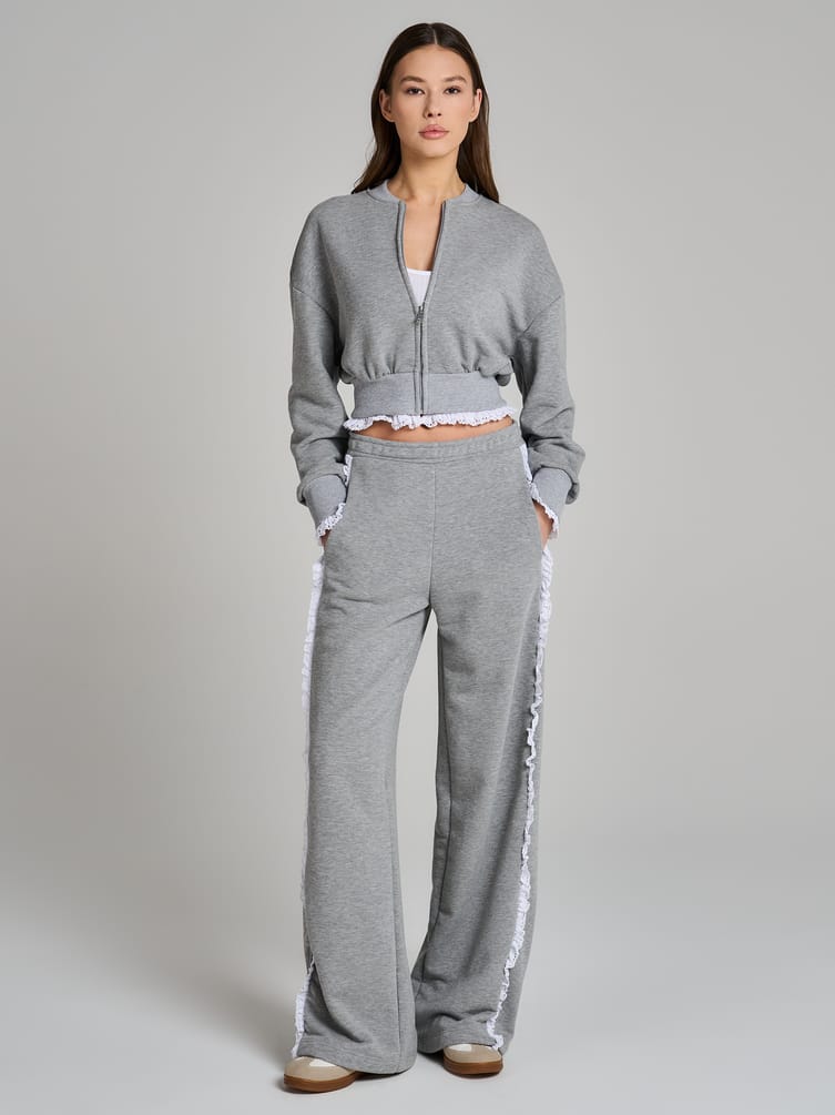 Широкие брюки с лампасами из кружева