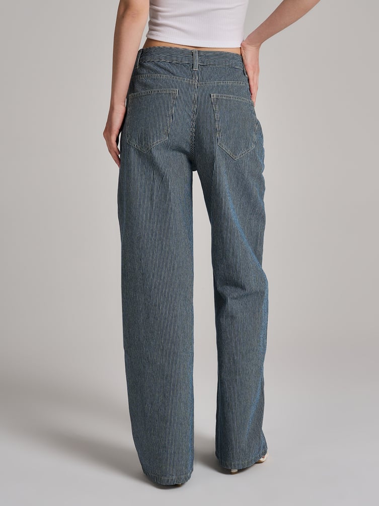 Джинсы широкие с вареным эффектом