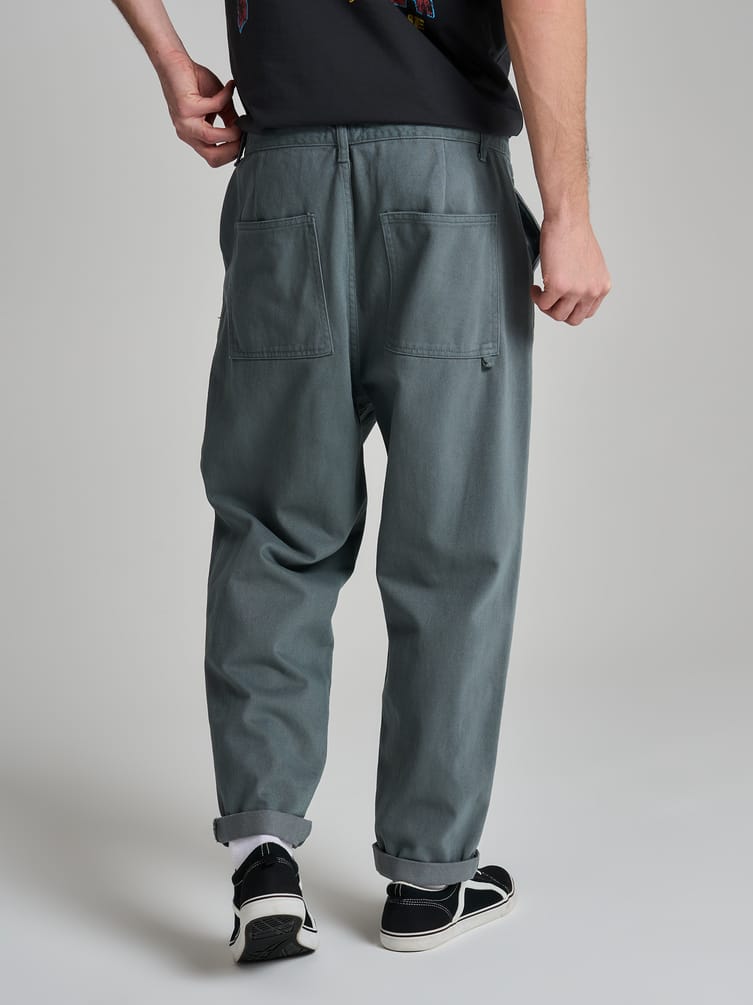 Зауженные широкие брюки