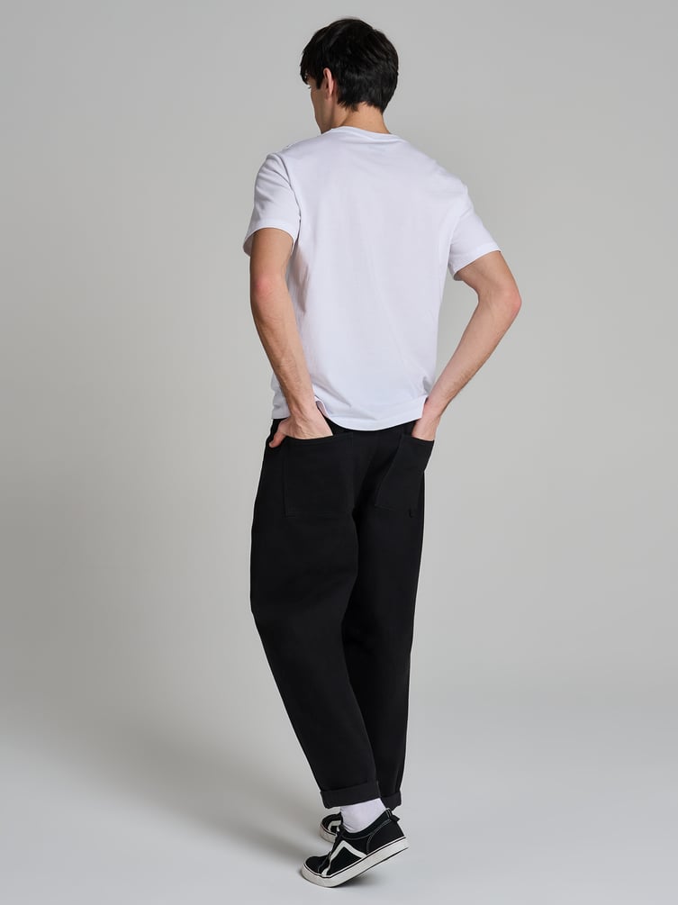 Зауженные широкие брюки