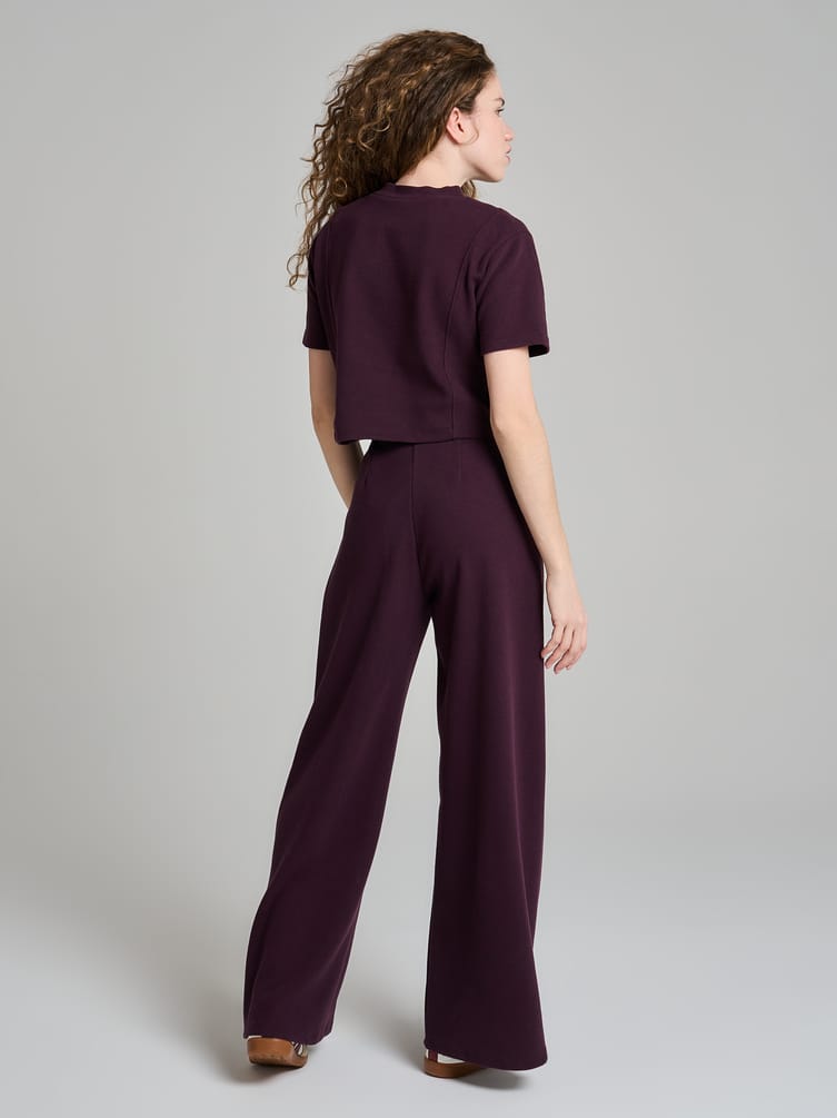 Широкие брюки в рубчик со стрелками