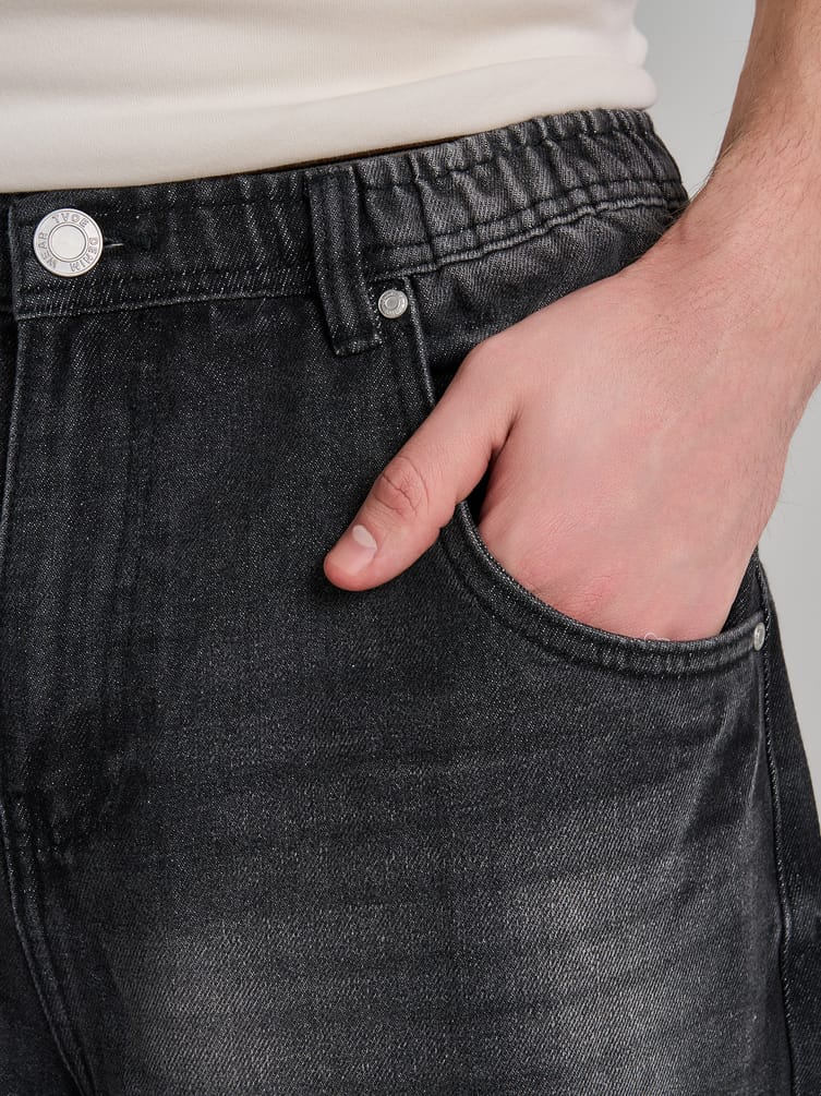 Джинсы багги с вареным эффектом