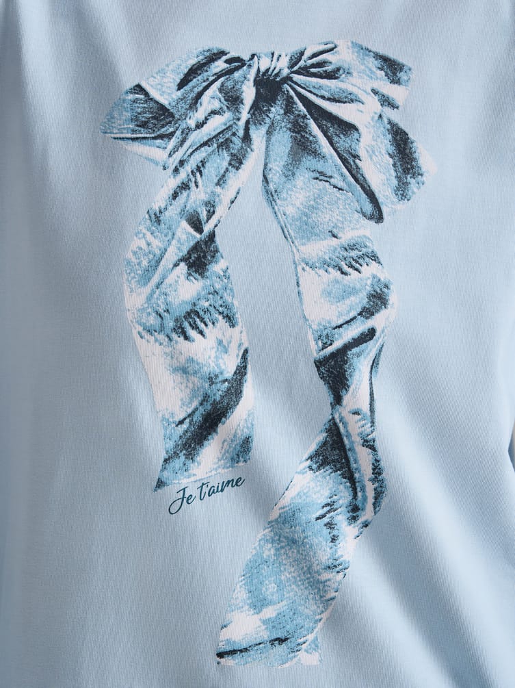 Лонгслив оверсайз с принтом банта