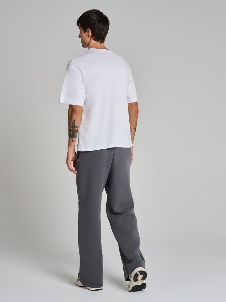 Теплые брюки оверсайз с надписью и начесом