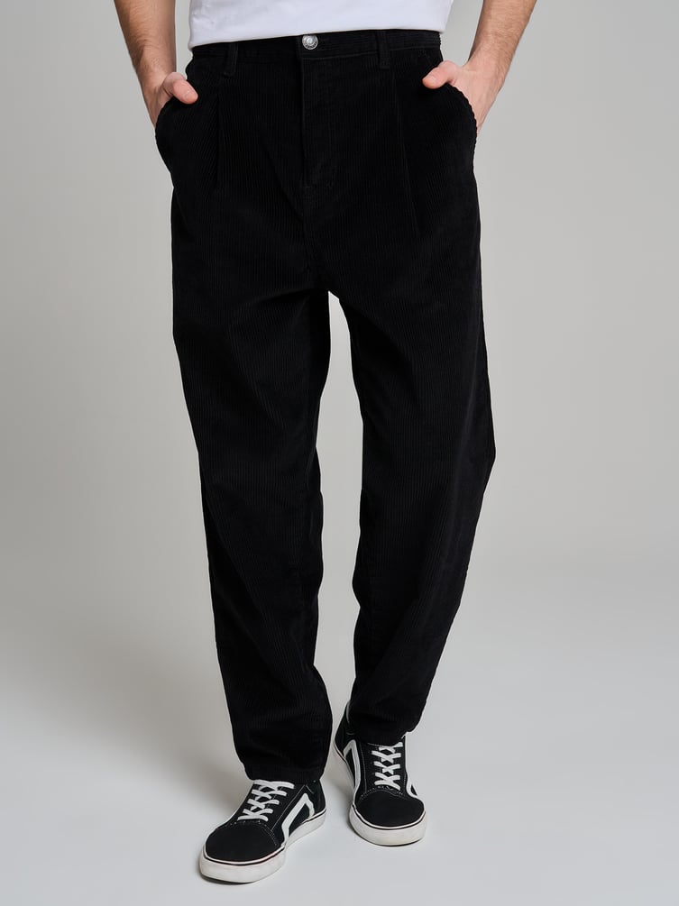 Вельветовые зауженные брюки