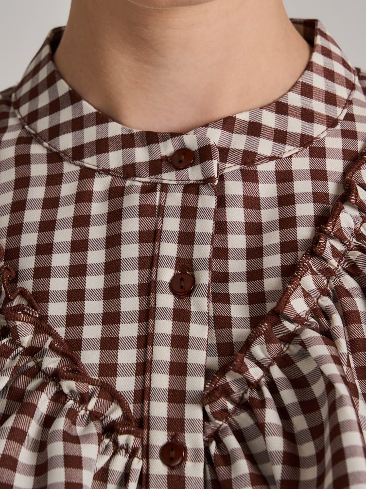 Блузка клетчатая с воланами