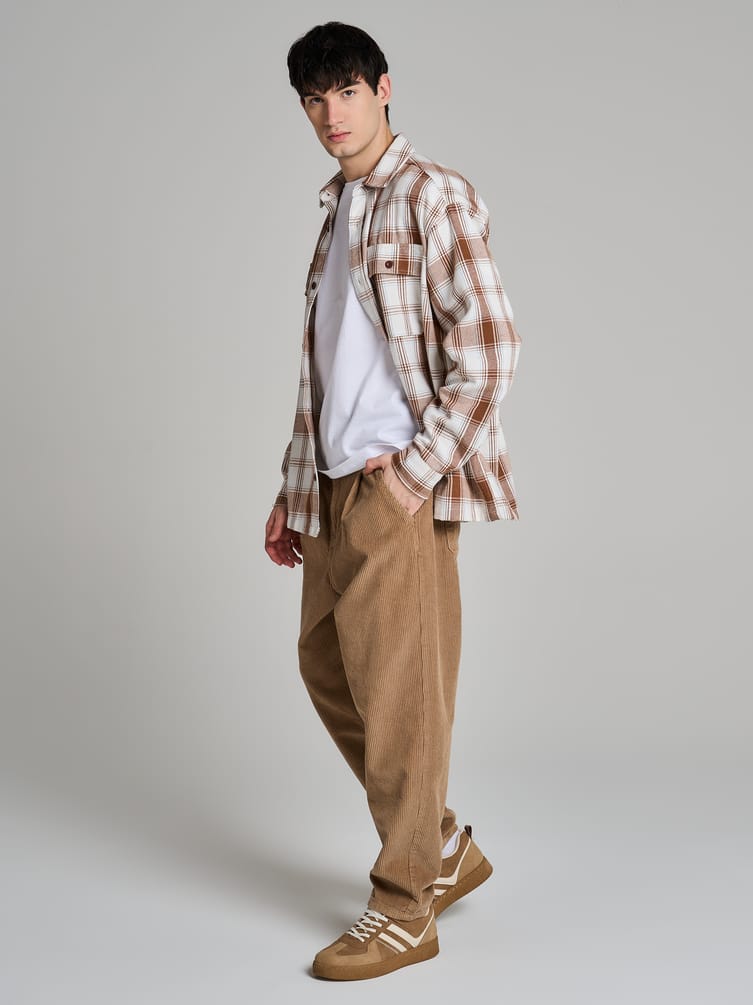 Вельветовые зауженные брюки