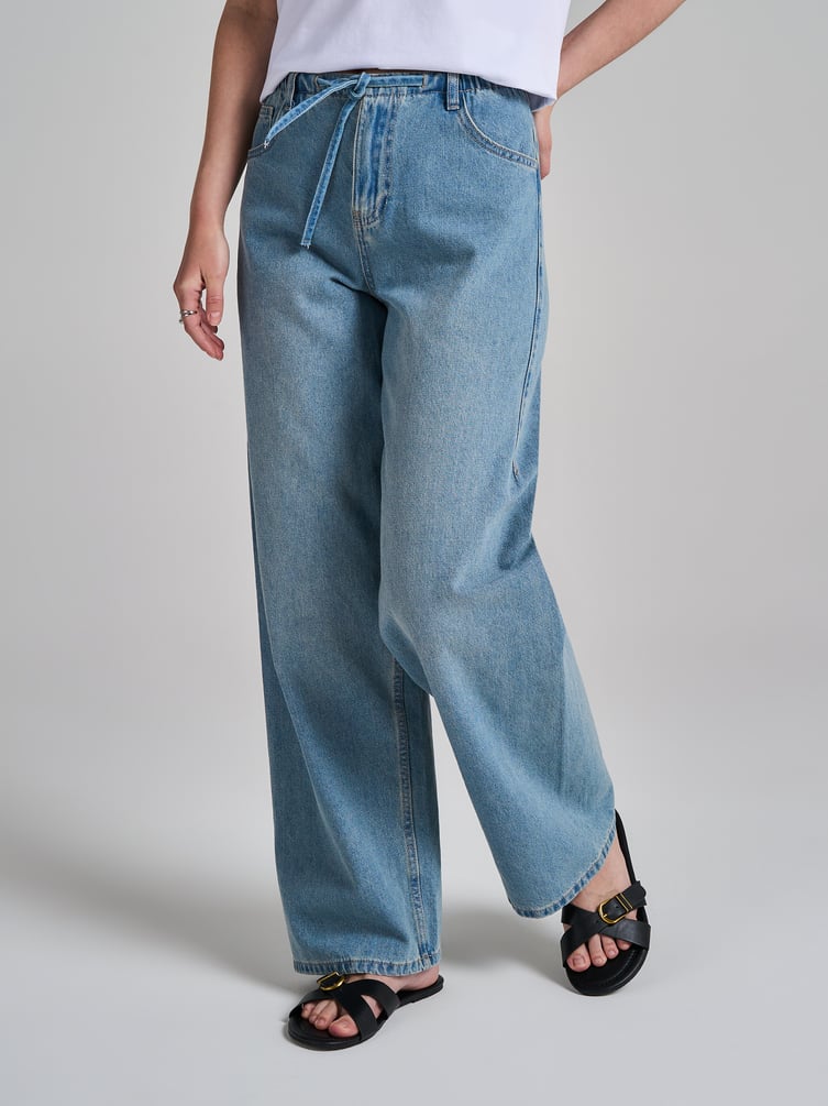 Широкие джинсы на резинке