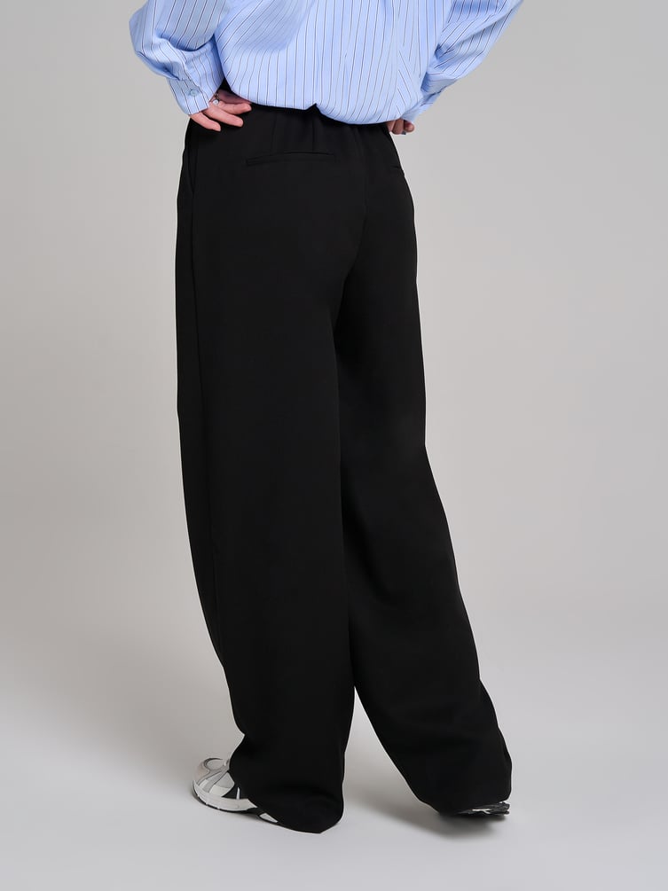 Брюки бананы классические