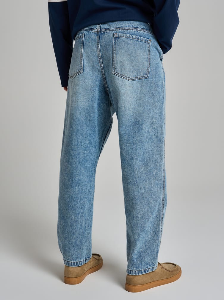 Зауженные джинсы бананы