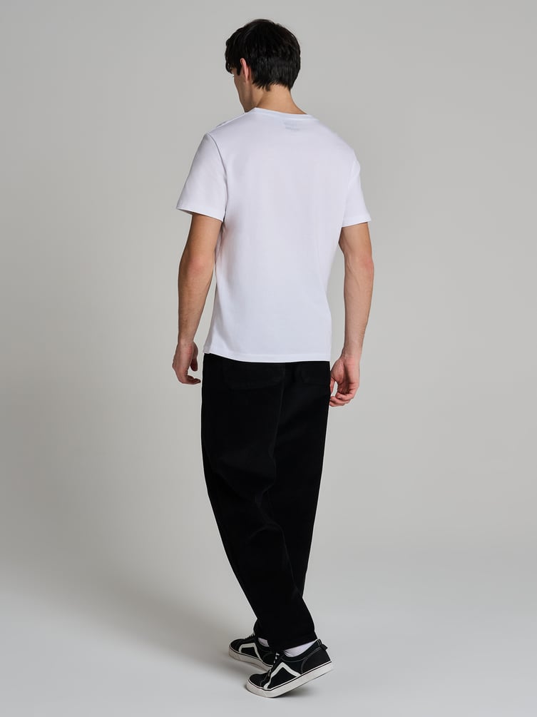 Вельветовые зауженные брюки