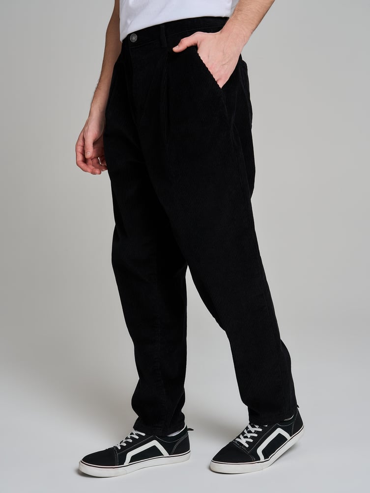 Вельветовые зауженные брюки