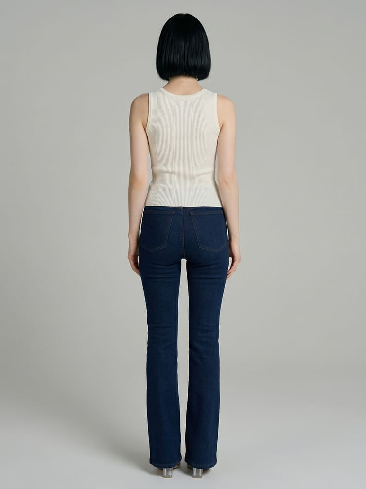 Джинсы клеш от колена