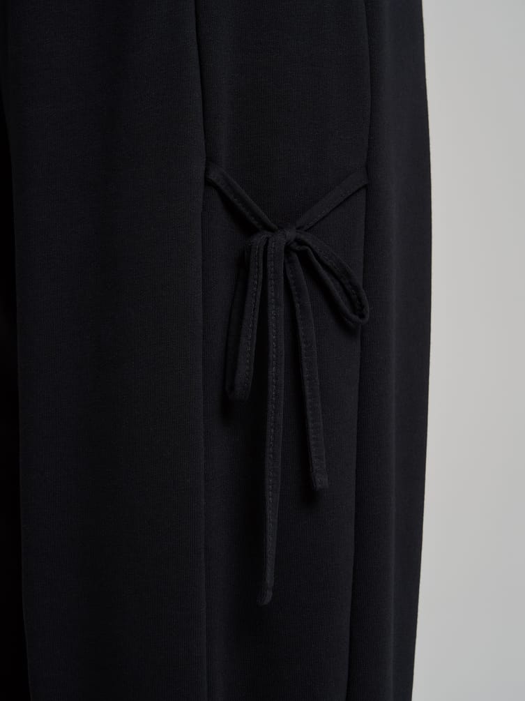 Брюки джоггеры с завязками по бокам