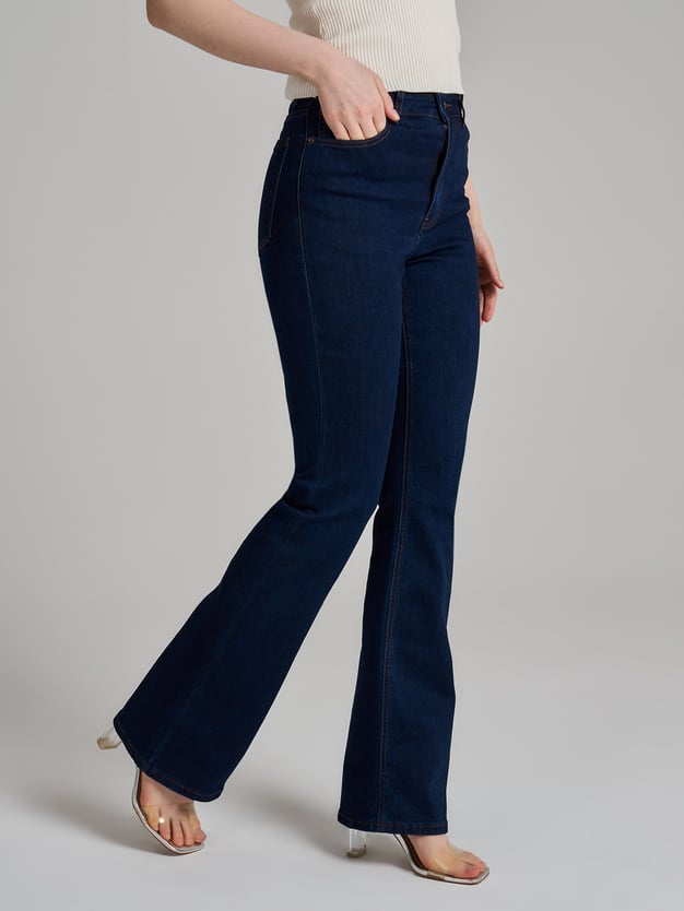 Джинсы клеш от колена