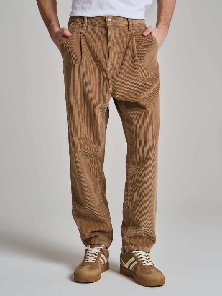 Вельветовые зауженные брюки