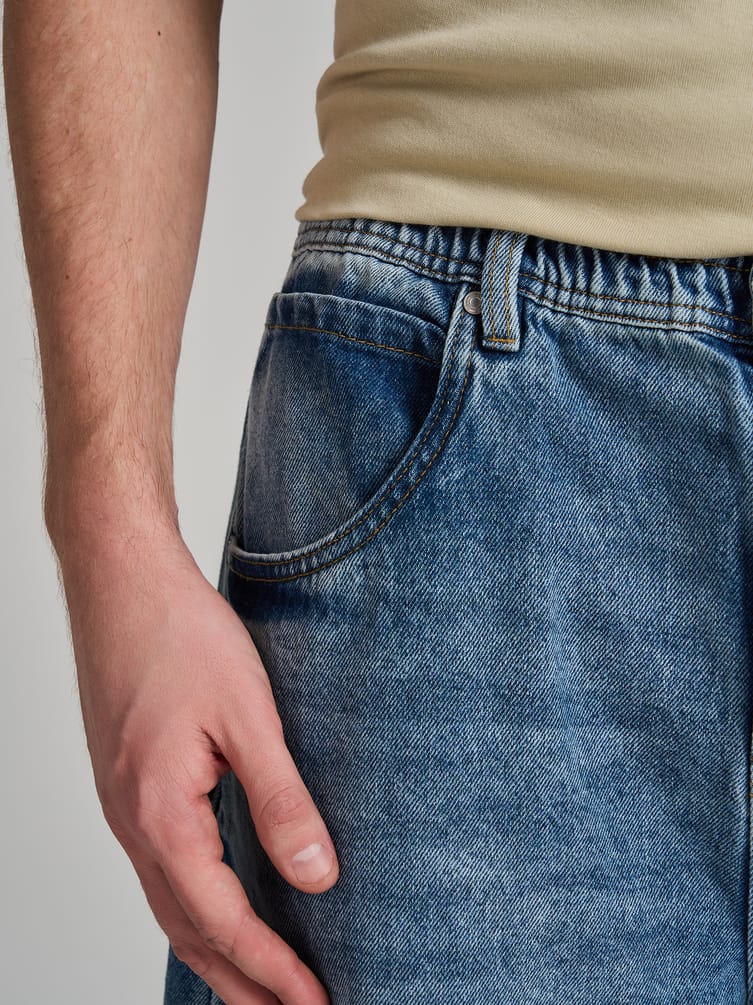 Джинсы багги с вареным эффектом