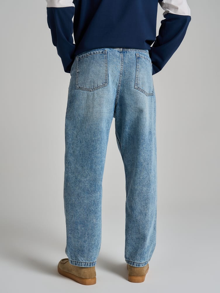 Зауженные джинсы бананы