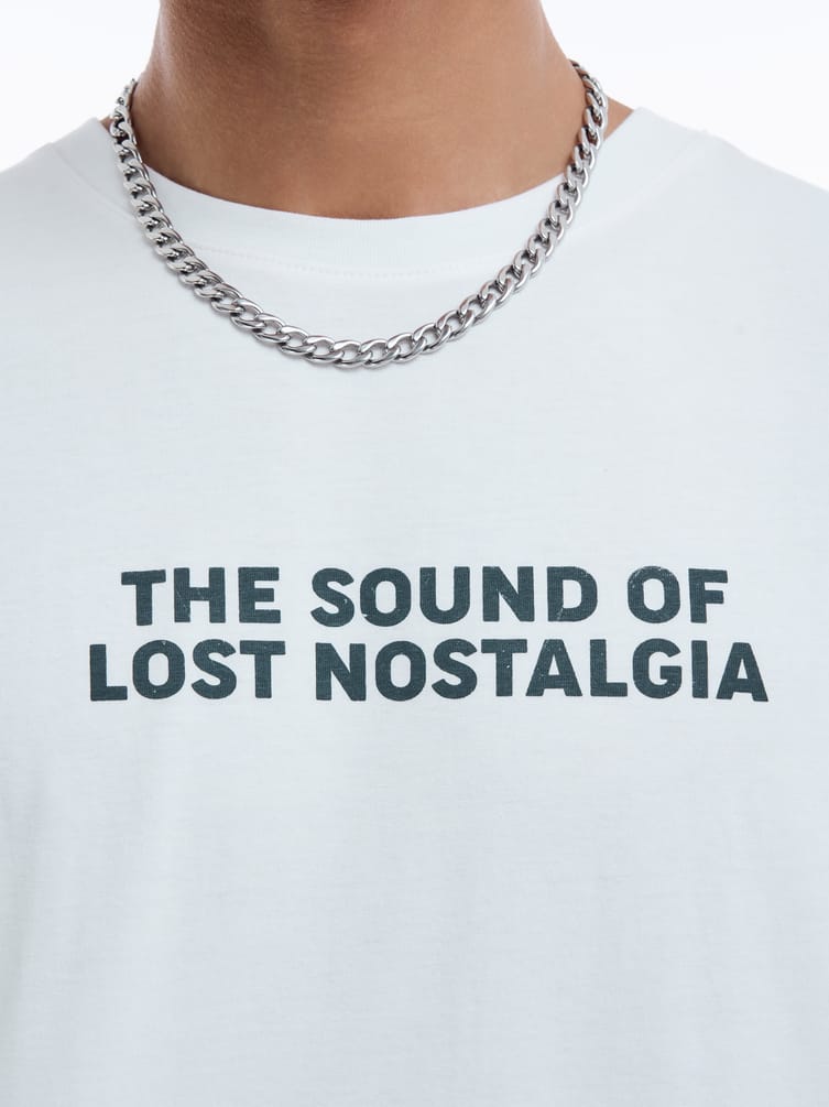 Футболка оверсайз с принтом аудиоплеера на спине