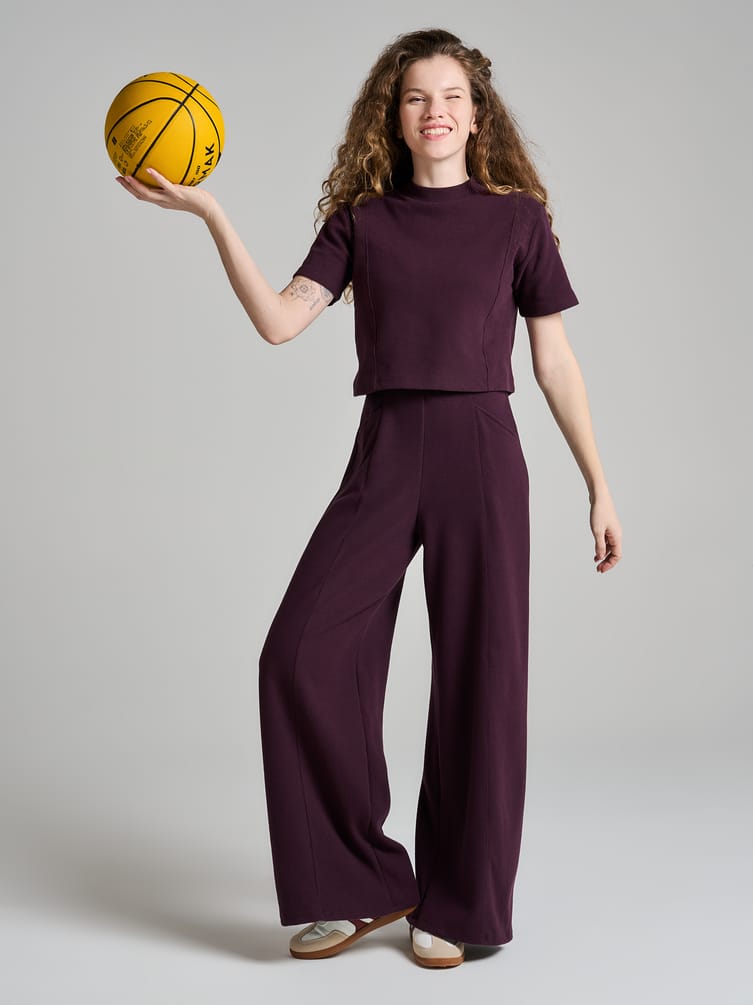 Широкие брюки в рубчик со стрелками