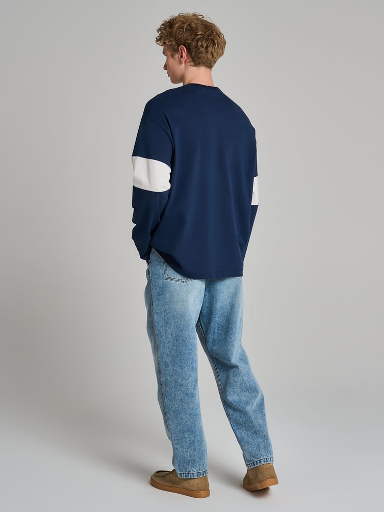 Зауженные джинсы бананы