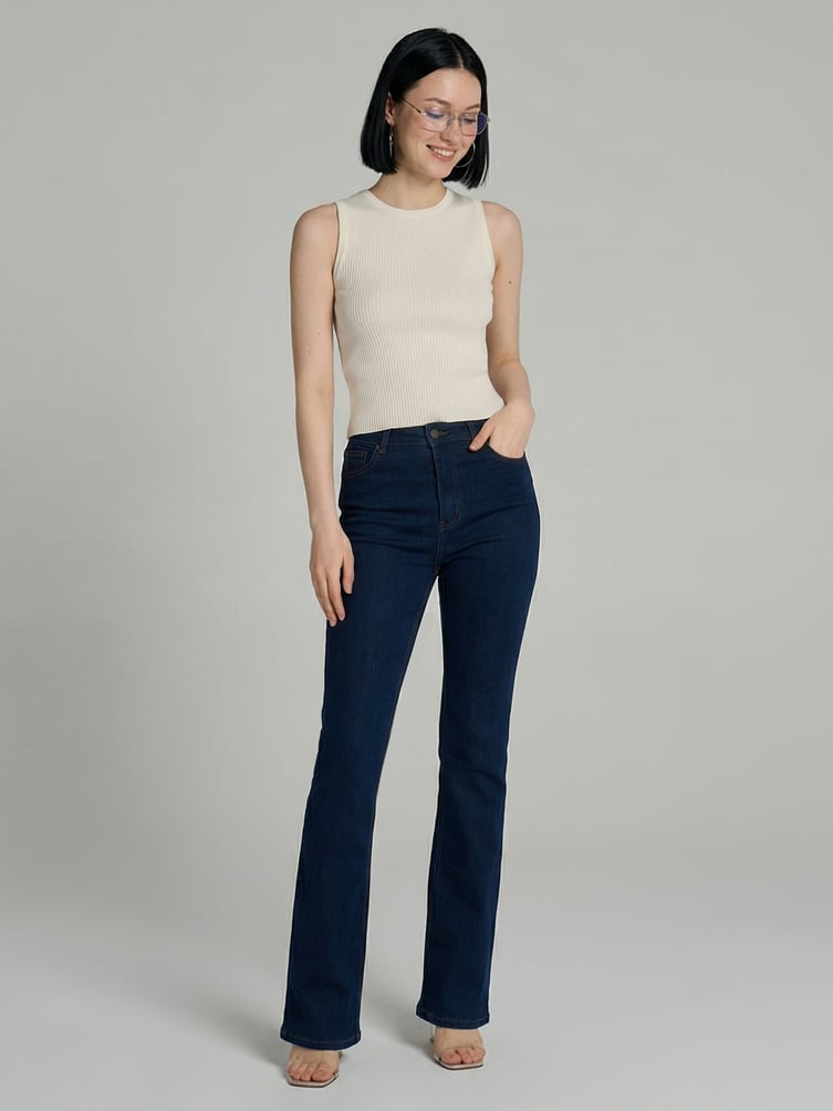 Джинсы клеш от колена