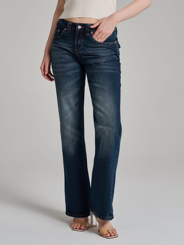 Джинсы клеш от колена с заниженной талией